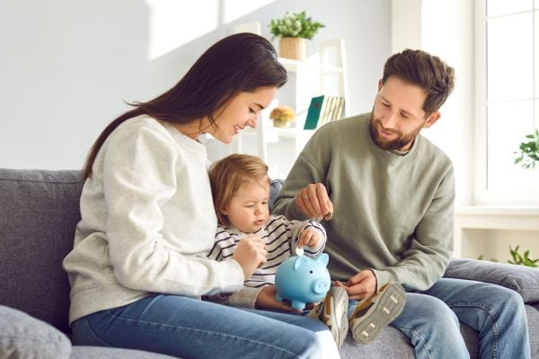 Parents saving with child