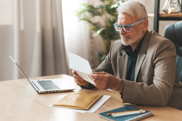 https://2073866.fs1.hubspotusercontent-na1.net/hubfs/2073866/2025/2025%20Summer%20news%20you%20can%20use/AdobeStock_430477604_paychecklit.jpg