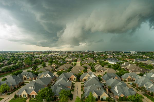 Looming spring storm clouds over neighborhood
